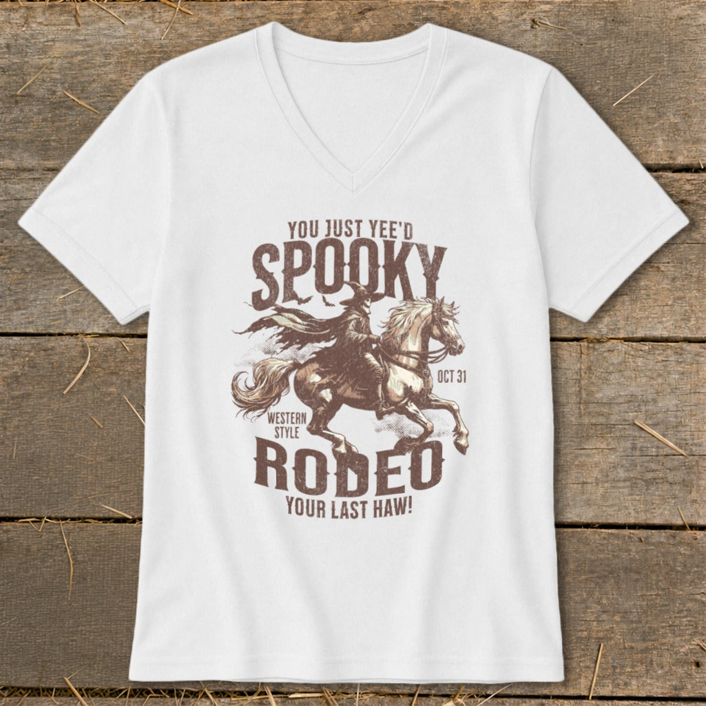 White t-shirt with spooky cowboy on horseback graphic and text.