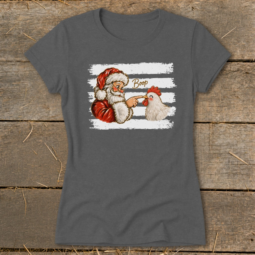 Santa booping a chicken with the word "Boop" above.
