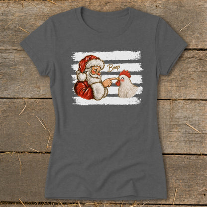 Santa booping a chicken with the word "Boop" above.