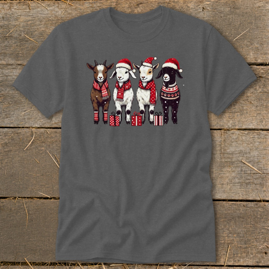 Four goats wearing Santa hats and festive scarves stand with gifts.
