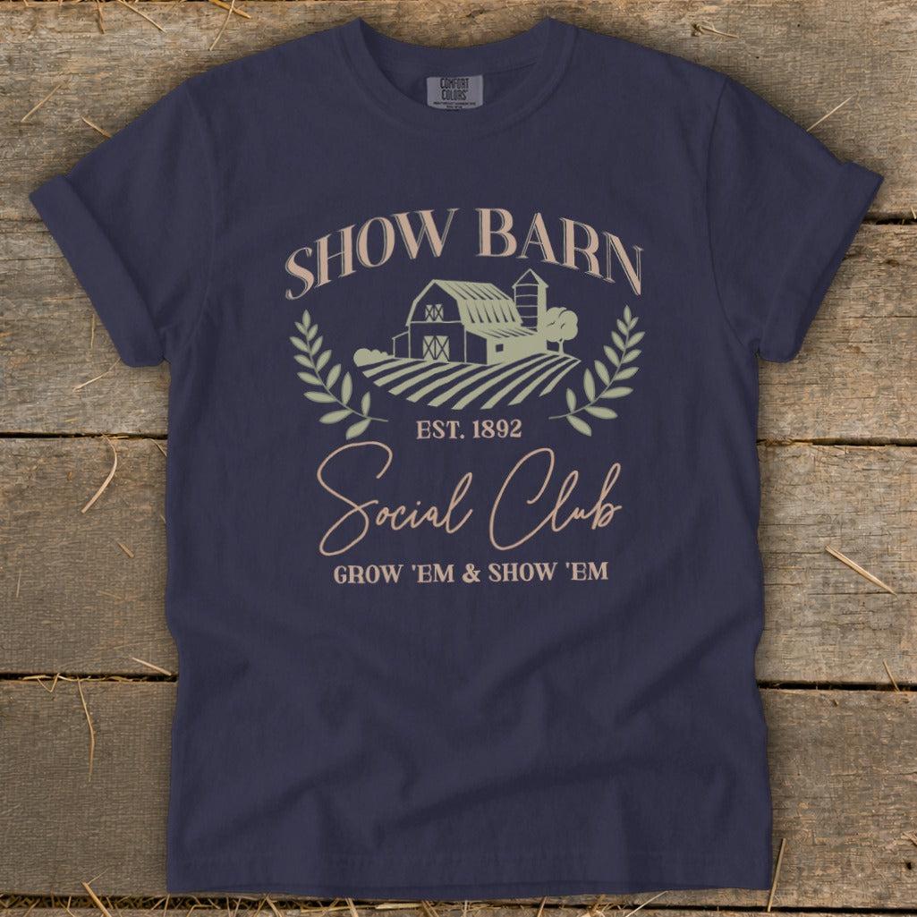 Navy t-shirt with "Show Barn Social Club" text, barn graphic, and "Grow 'Em & Show 'Em".