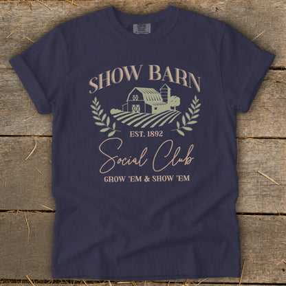 Navy t-shirt with "Show Barn Social Club" text, barn graphic, and "Grow 'Em & Show 'Em".