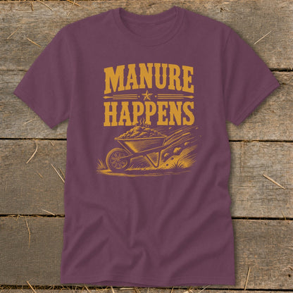 Purple t-shirt with "Manure Happens" text and a wheelbarrow of manure graphic.