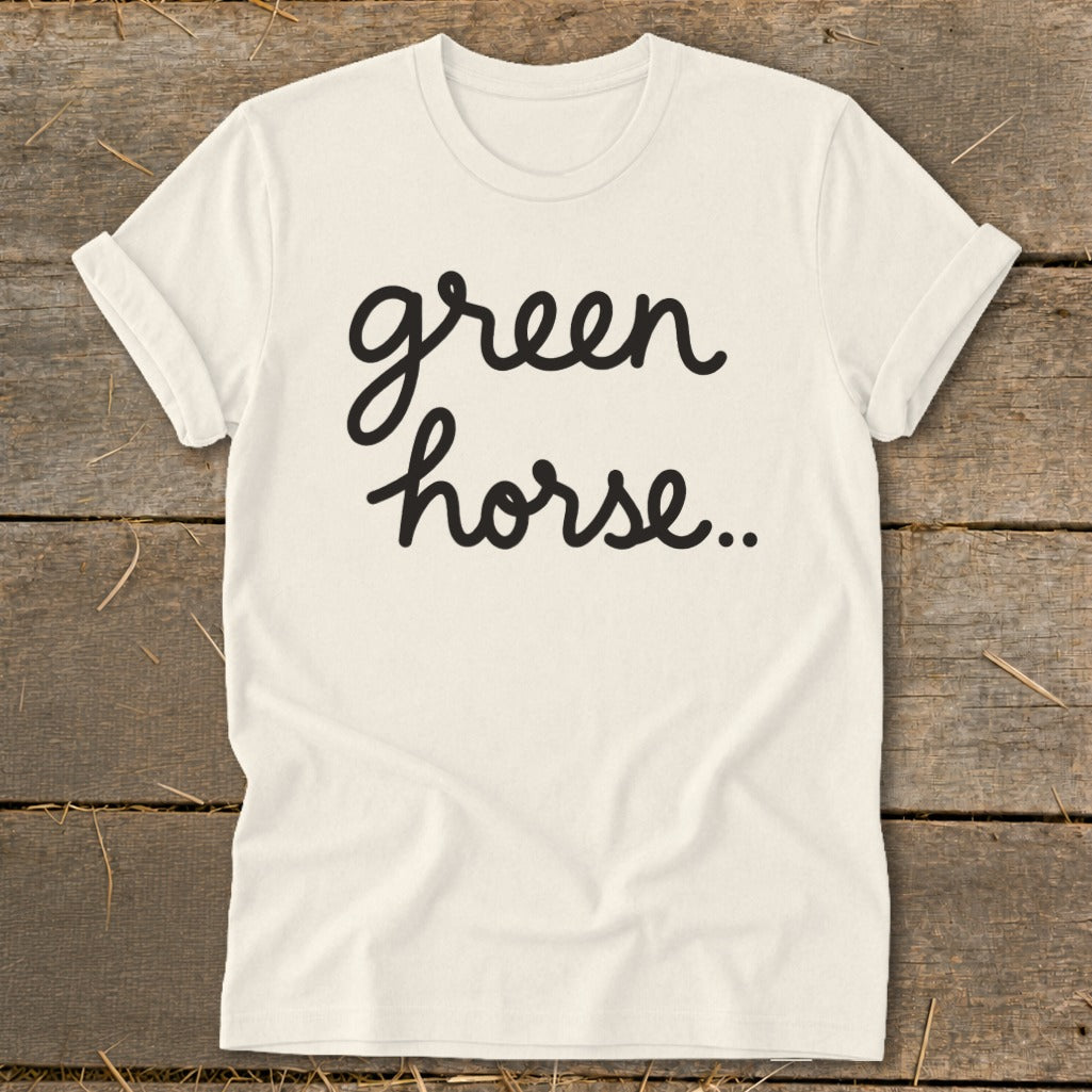 Cream t-shirt with black cursive text "green horse.."