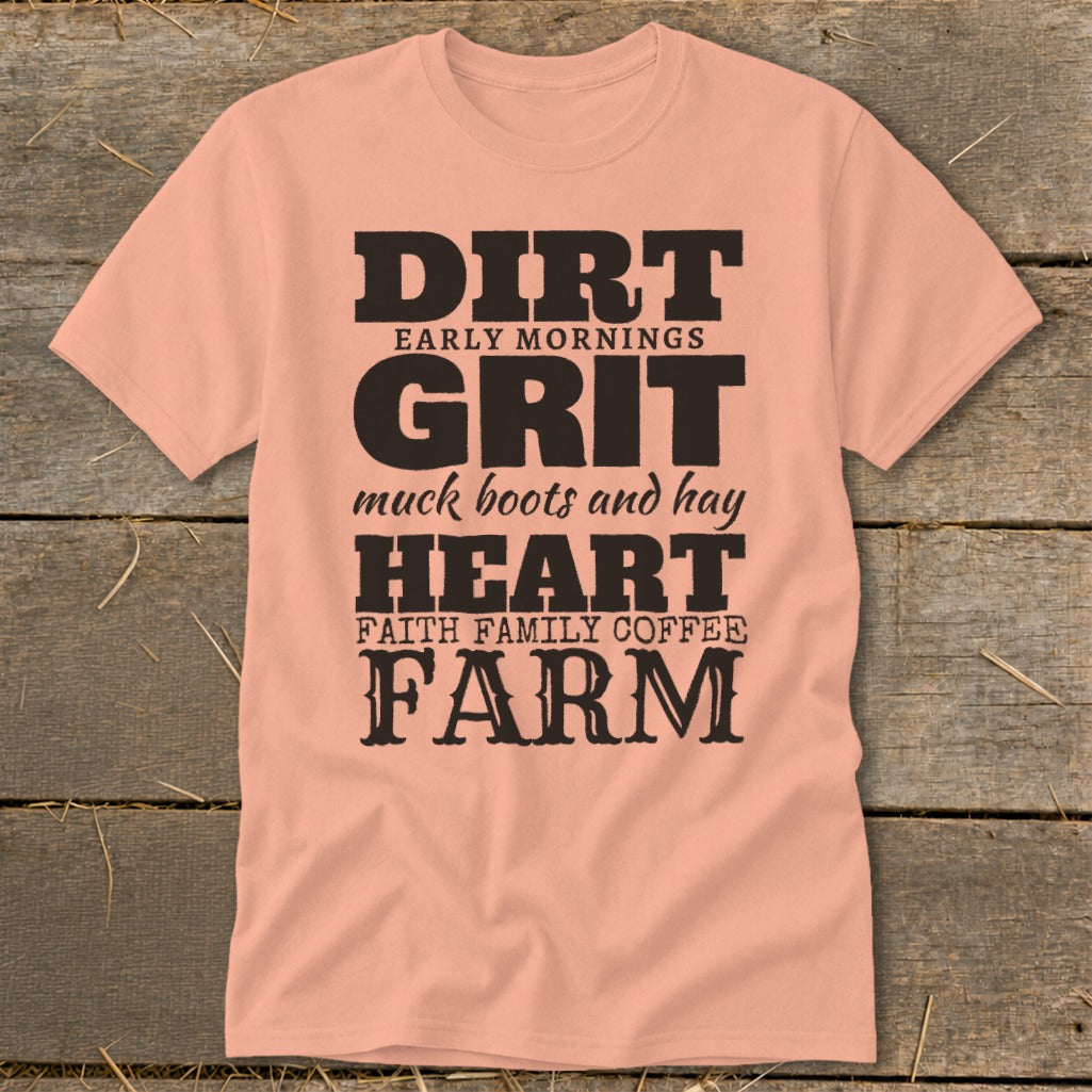Peach t-shirt with black text: "DIRT EARLY MORNINGS GRIT muck boots and hay HEART FAITH FAMILY COFFEE FARM"