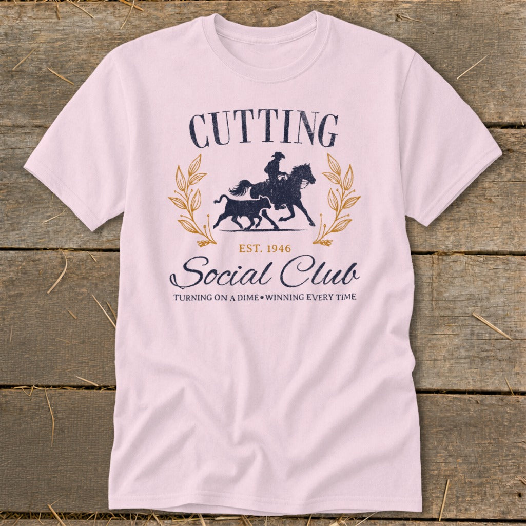 Pink t-shirt with "Cutting Social Club" and a horse and steer graphic.