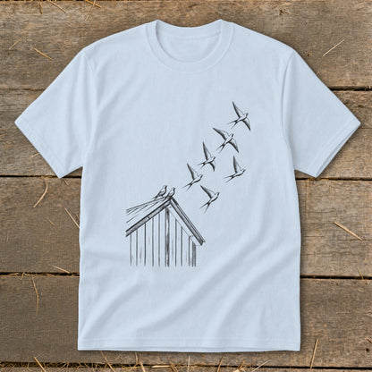 Light blue crewneck t-shirt featuring a black line art graphic of birds taking flight from a rooftop.