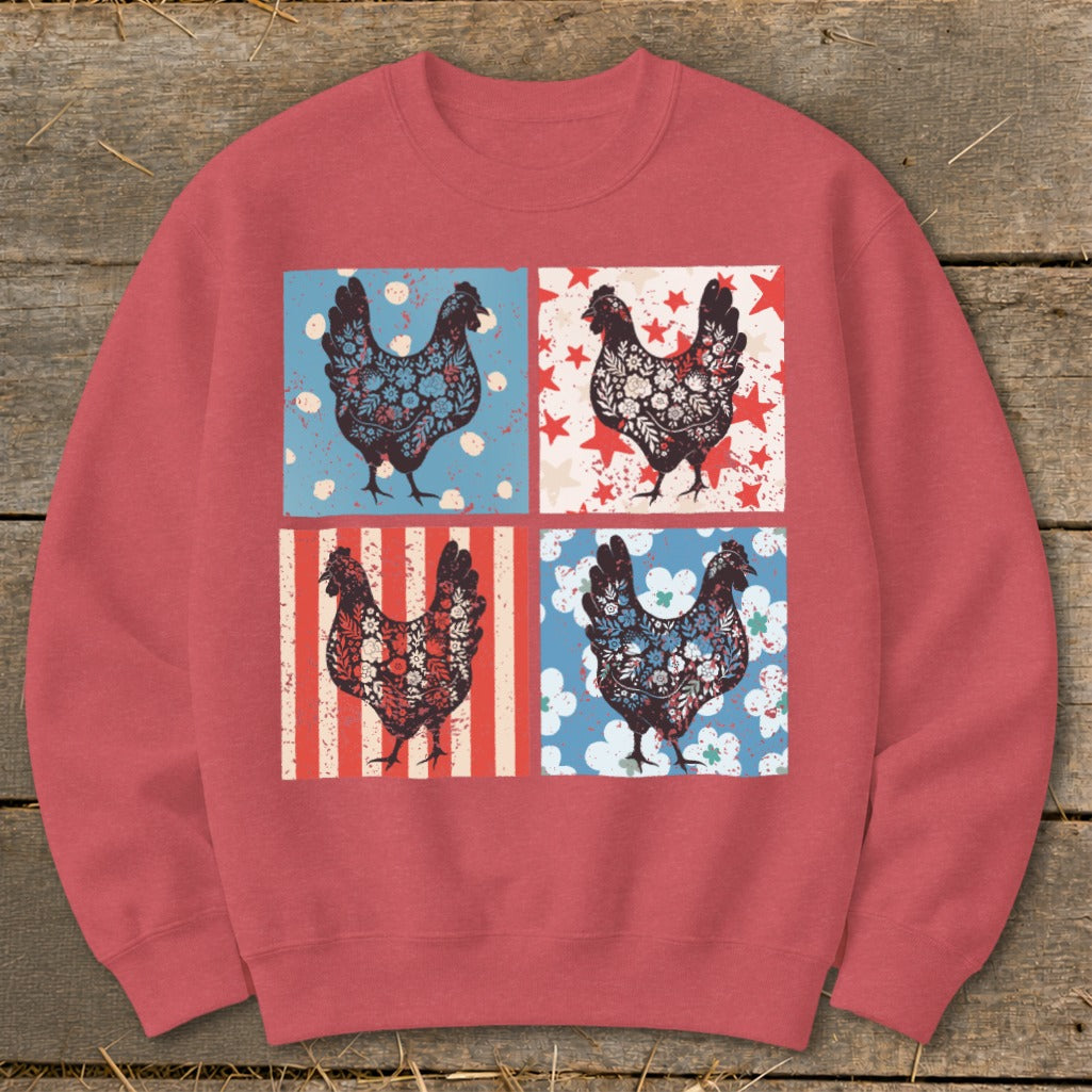 Crewneck sweatshirt with four patterned chickens on a rustic wood background.