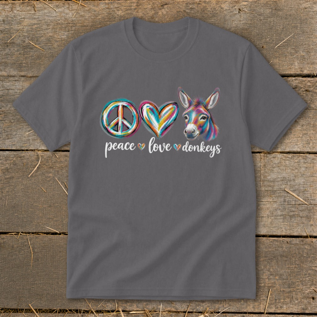 T-shirt with colorful peace sign, heart, and donkey head with text "peace love donkeys."