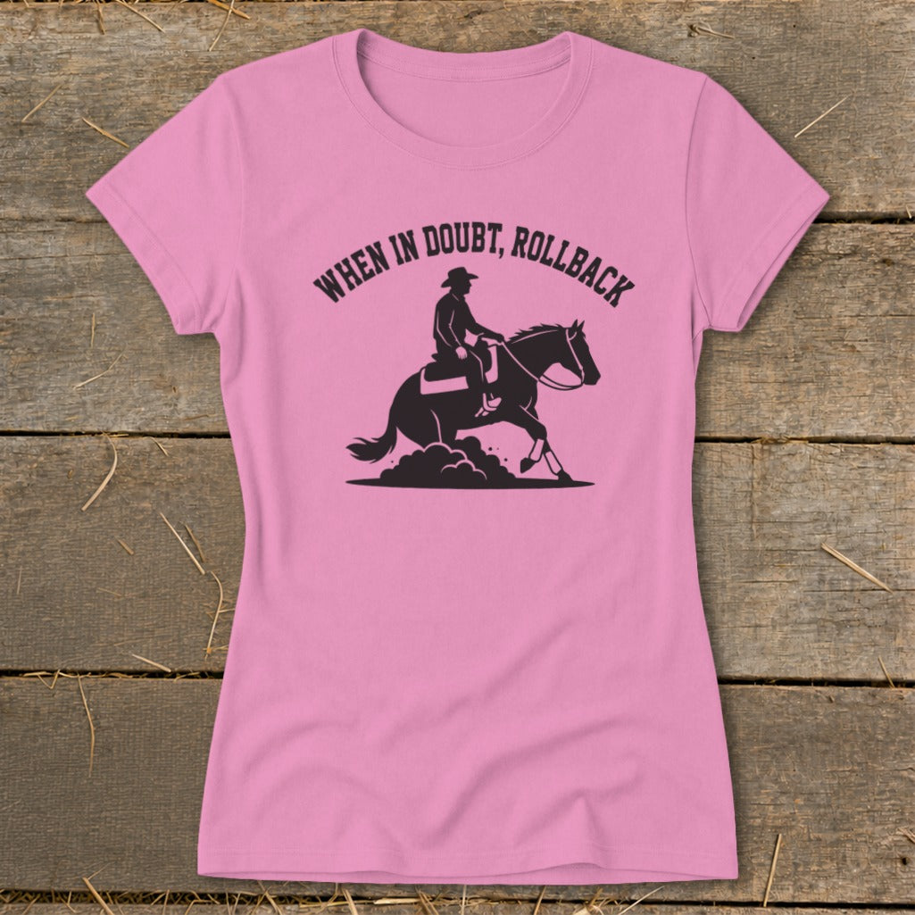 Pink t-shirt with "When in doubt, rollback" and horse rider graphic.