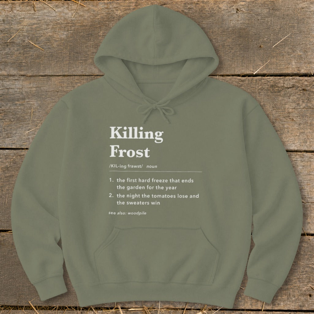 An olive green hoodie featuring a dictionary-style definition of Killing Frost in white text centered on the chest.