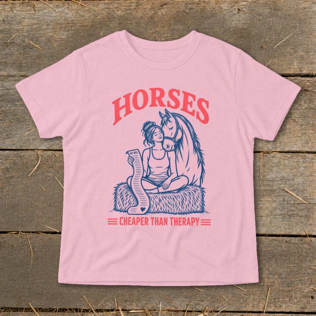 Pink t-shirt with "HORSES CHEAPER THAN THERAPY" text and horse graphic.