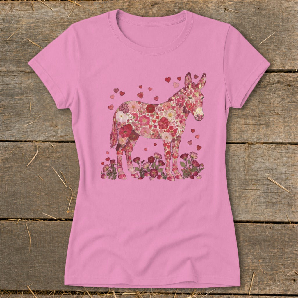 Pink t-shirt with a donkey silhouette filled with pink and red flowers and hearts.