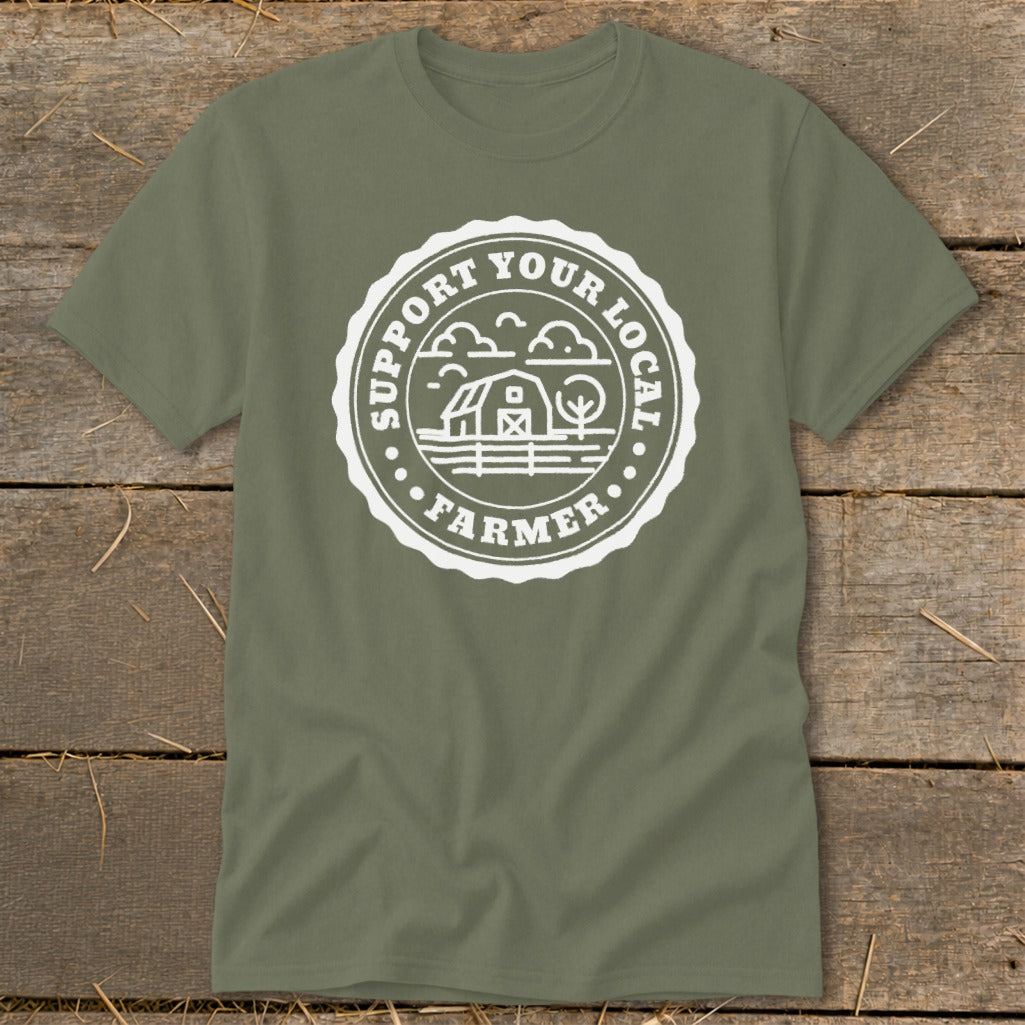 Olive t-shirt with white "Support Your Local Farmer" circular emblem and barn graphic.