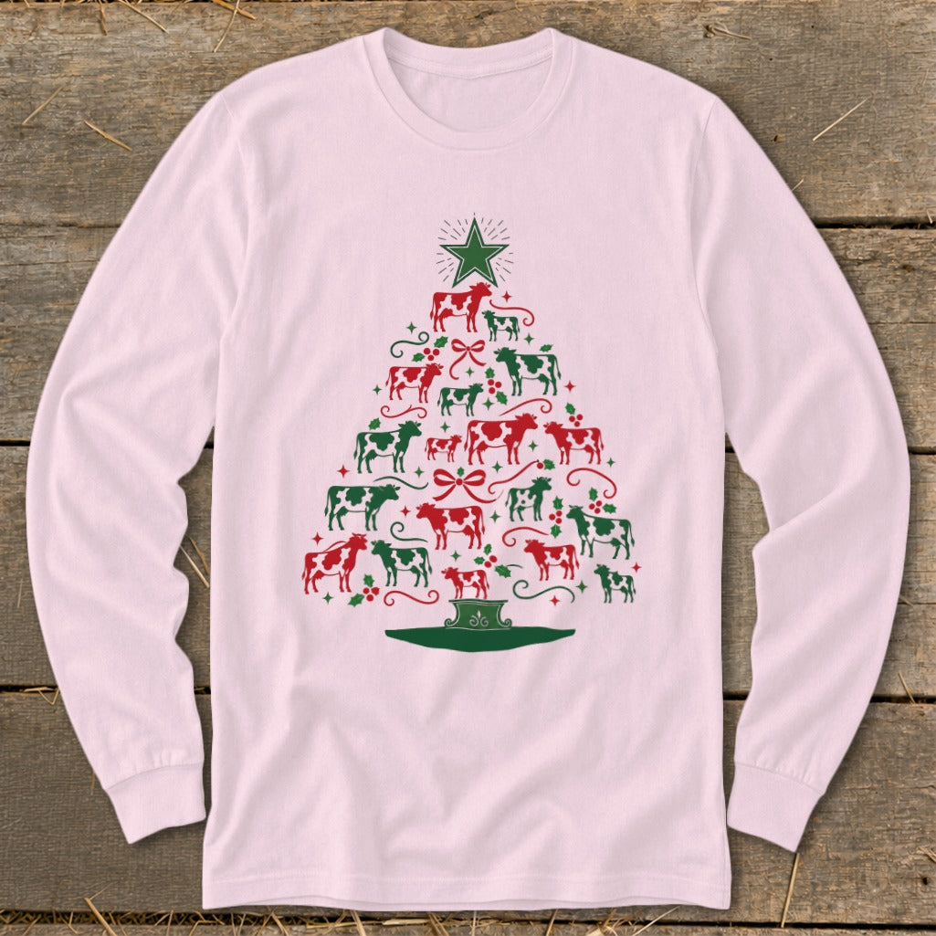 Pink long-sleeve shirt with a Christmas tree design made of red and green cows.