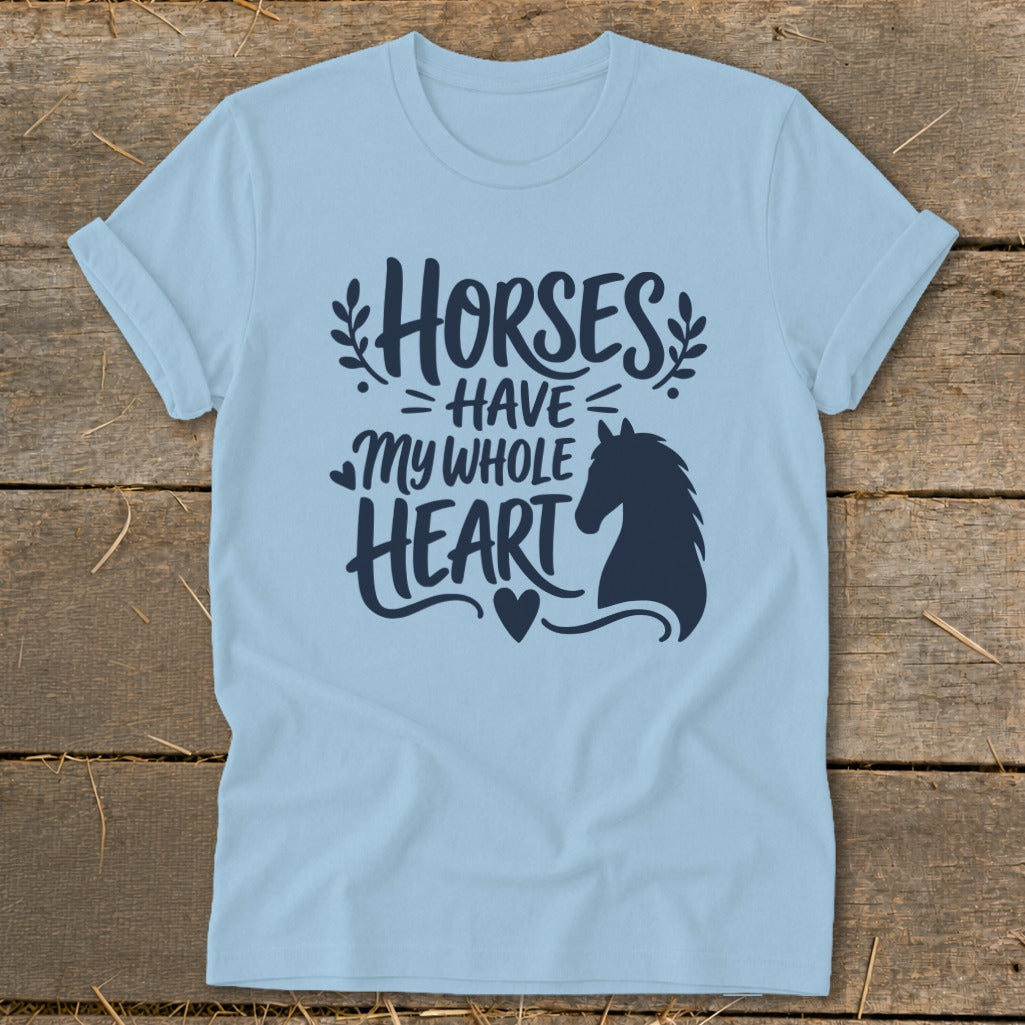 Light blue t-shirt with navy graphic saying "Horses Have My Whole Heart" and horse silhouette.