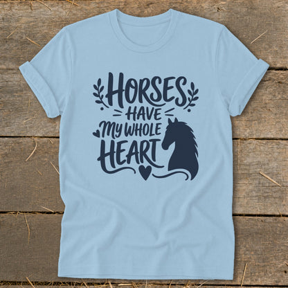 Light blue t-shirt with navy graphic saying "Horses Have My Whole Heart" and horse silhouette.