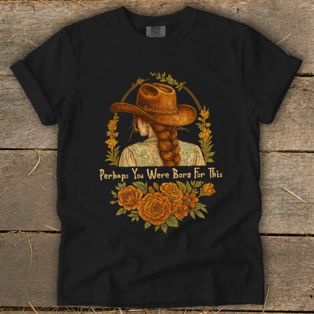 Black t-shirt with cowboy hat, braided hair, and floral design with text.