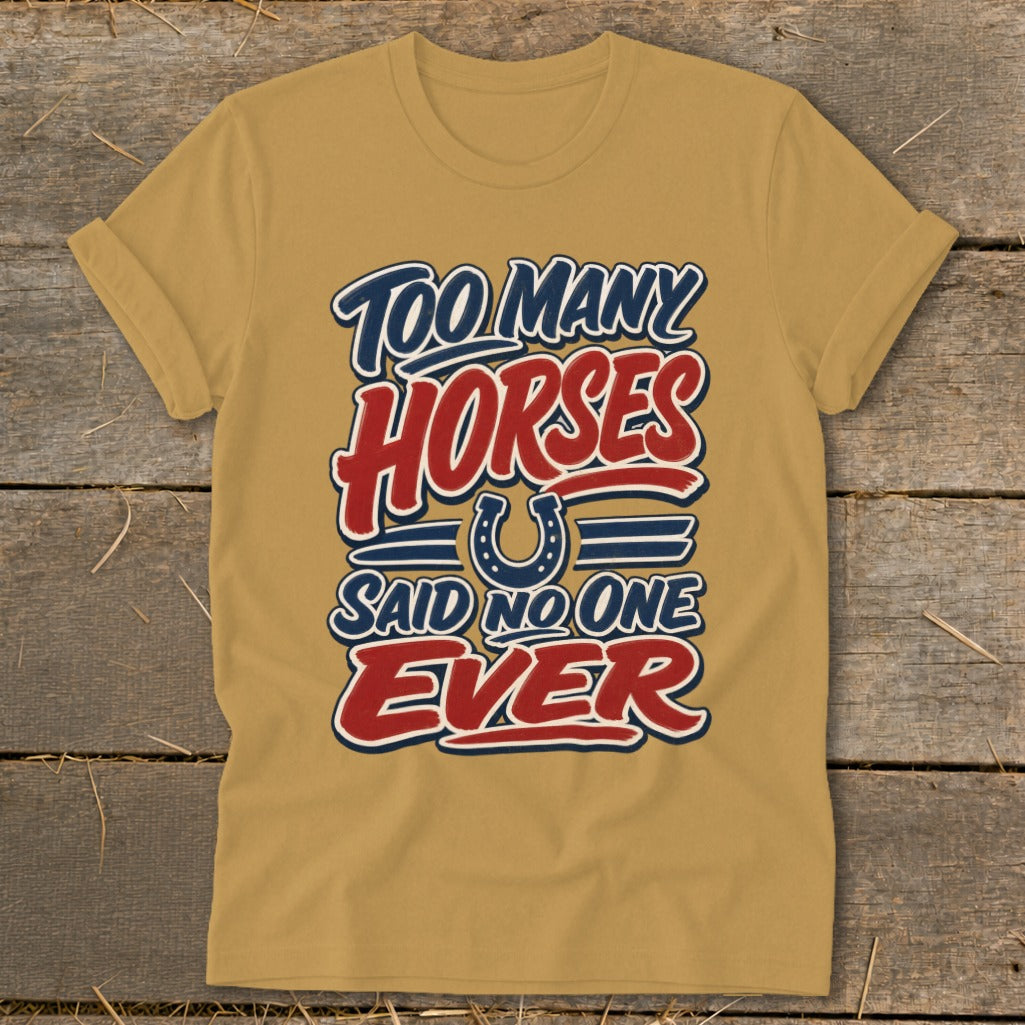 Gold t-shirt with "Too Many Horses Said No One Ever" text and horseshoe graphic.