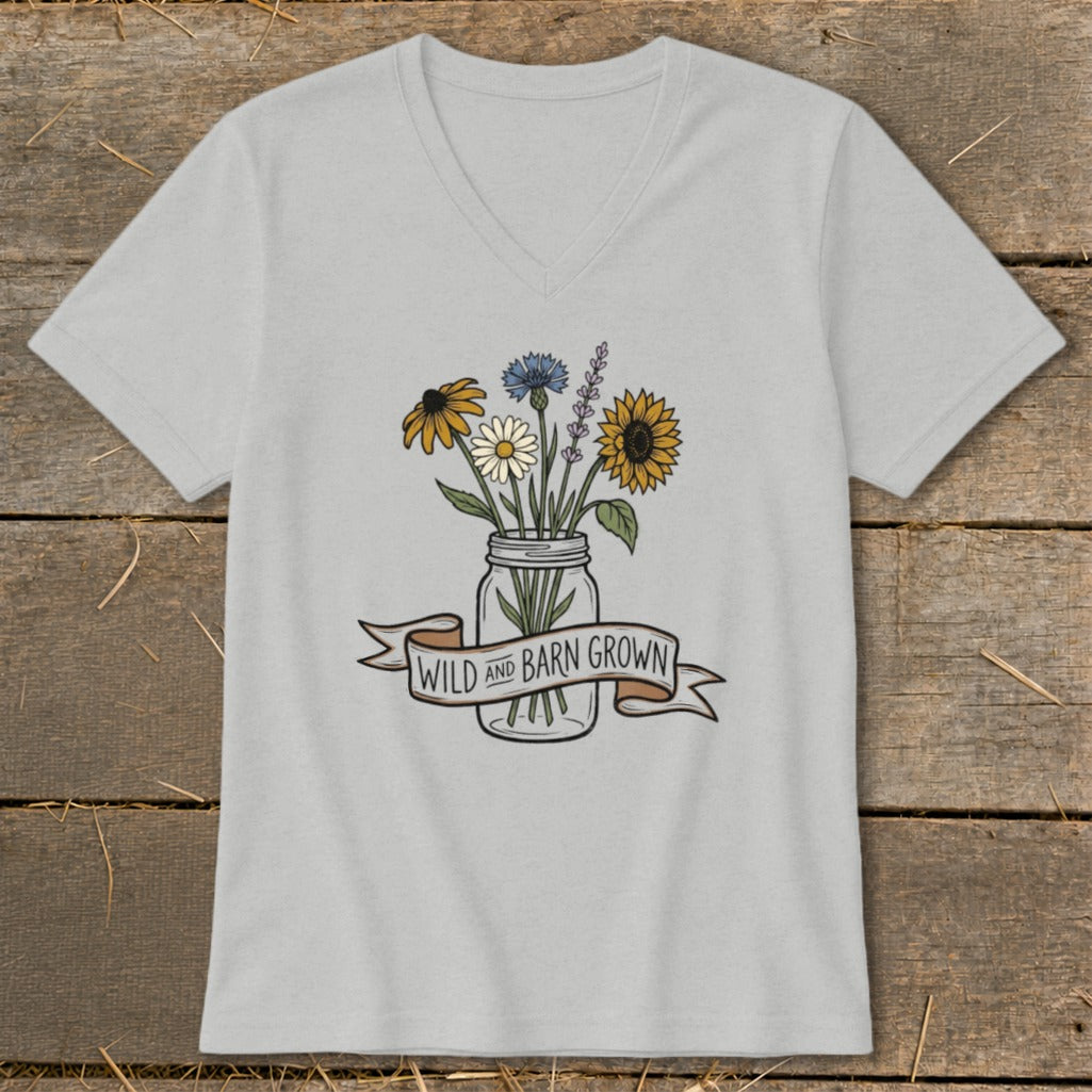 Light gray v-neck t-shirt with a mason jar of wildflowers and "WILD AND BARN GROWN" banner.