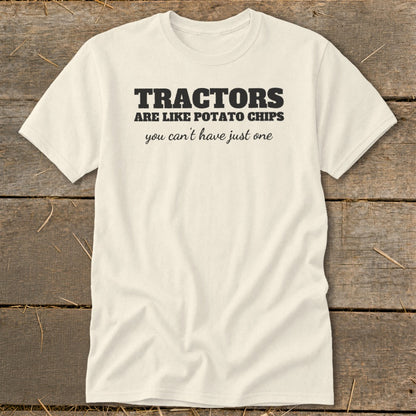 Cream t-shirt with "Tractors are like potato chips you can't have just one" text.