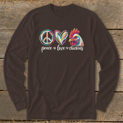 Brown long sleeve shirt with peace, heart, and chicken graphic and text.