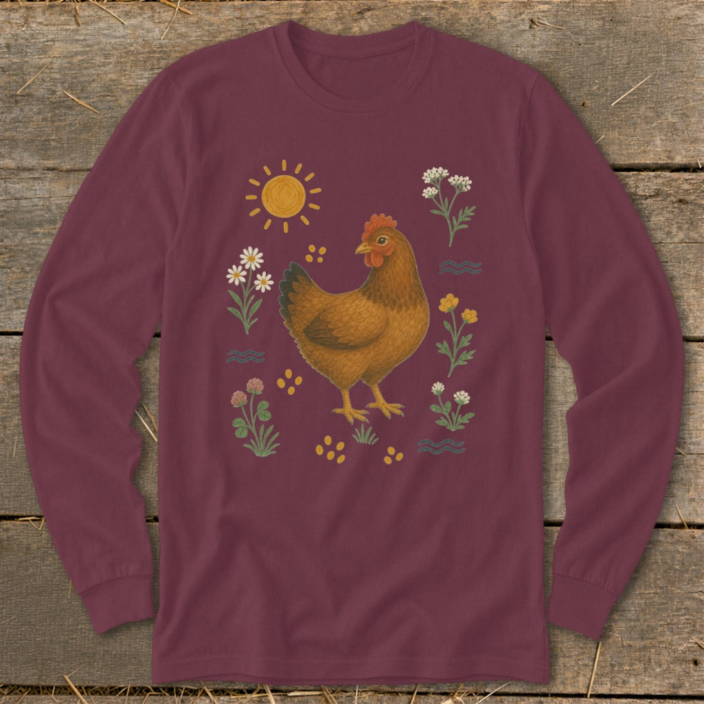 Maroon long-sleeve shirt with a brown chicken, sun, flowers, and clover graphic.