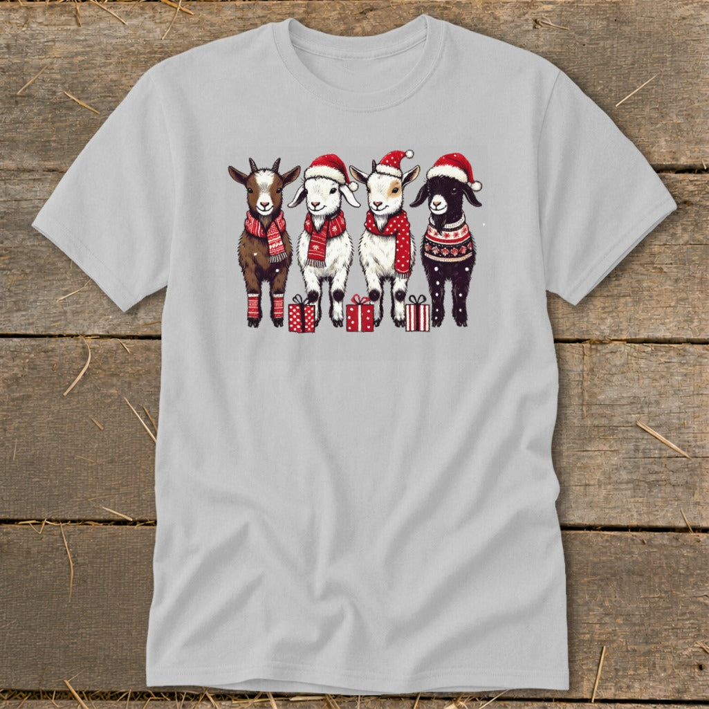 Four cartoon goats wearing Santa hats and scarves stand with presents.
