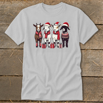 Four cartoon goats wearing Santa hats and scarves stand with presents.