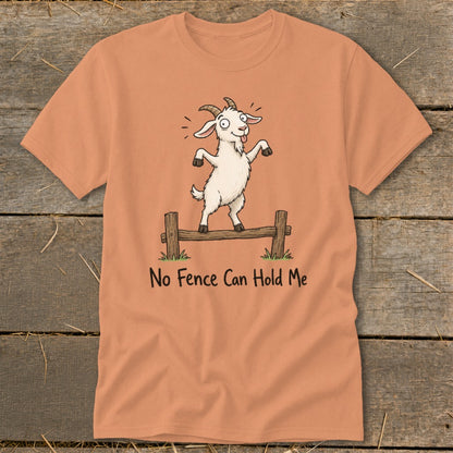 Peach t-shirt with a cartoon goat standing on a fence with text "No Fence Can Hold Me".