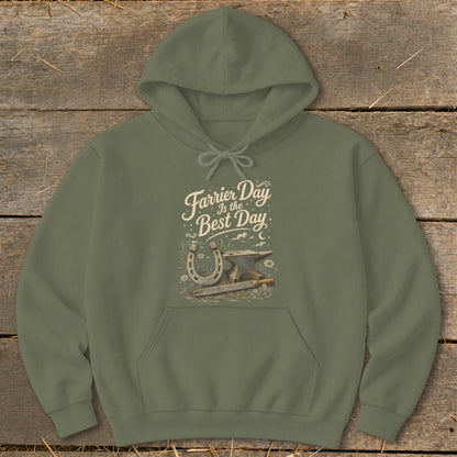 Olive green hoodie with "Farrier Day Is the Best Day" text and horseshoe, anvil, and flowers graphic.