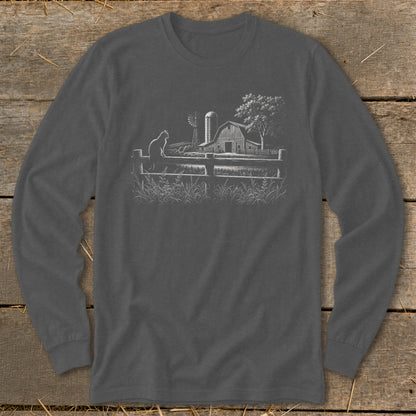 Line drawing of a cat on a fence with a barn and windmill in the background.