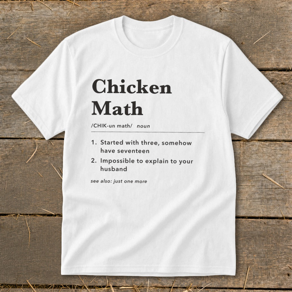 White t-shirt with "Chicken Math" definition and humorous chicken math scenarios.