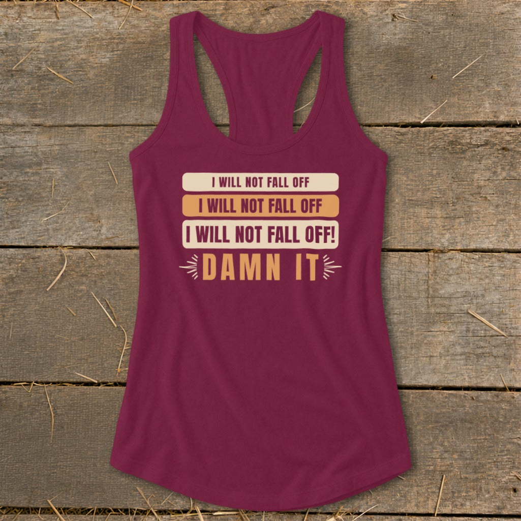 Maroon tank top with text "I Will Not Fall Off" and "Damn It" printed on it.
