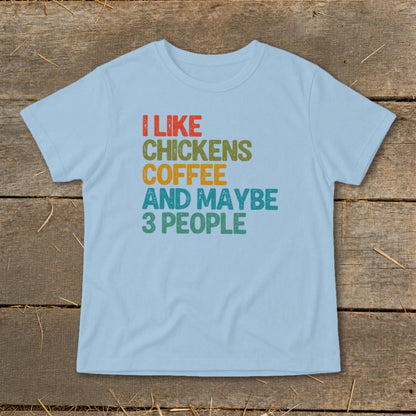 Light blue t-shirt with "I Like Chickens Coffee And Maybe 3 People" text.