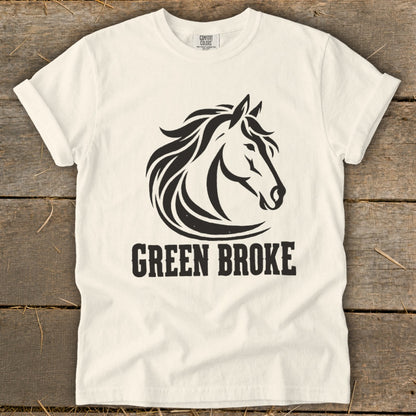 Off-white crewneck t-shirt featuring a black graphic of a horse head and the text GREEN BROKE.