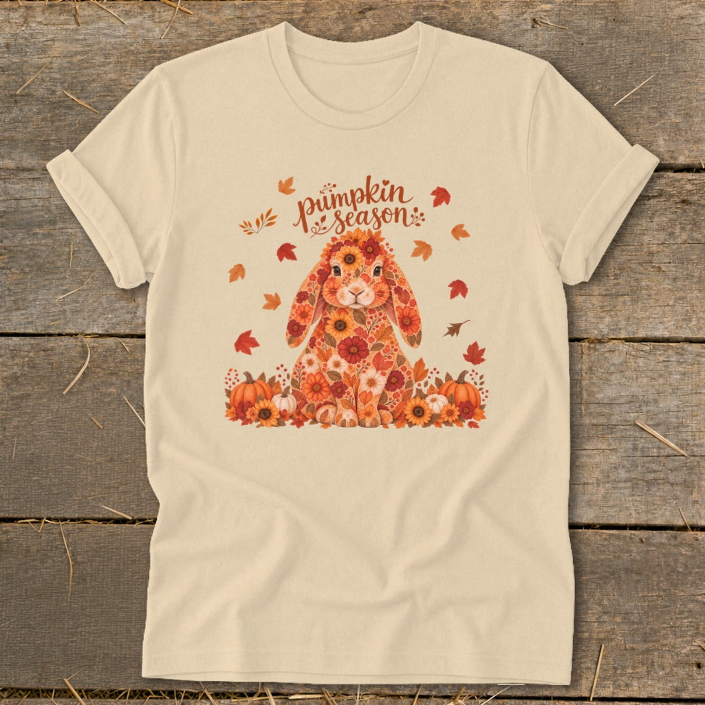 Cream t-shirt with a floral bunny and "pumpkin season" text surrounded by autumn leaves and pumpkins.