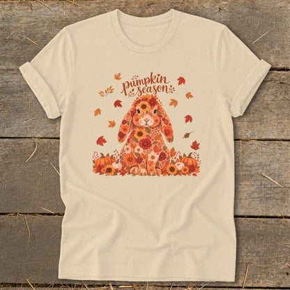 Cream t-shirt with a floral bunny and "pumpkin season" text surrounded by autumn leaves and pumpkins.
