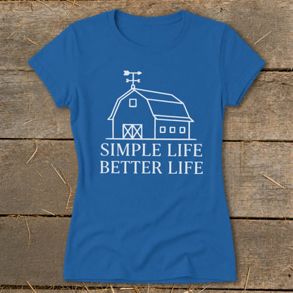 Blue t-shirt with white barn graphic and text "SIMPLE LIFE BETTER LIFE".