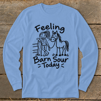 Light blue long sleeve shirt with stick figure girl and horse graphic and text.