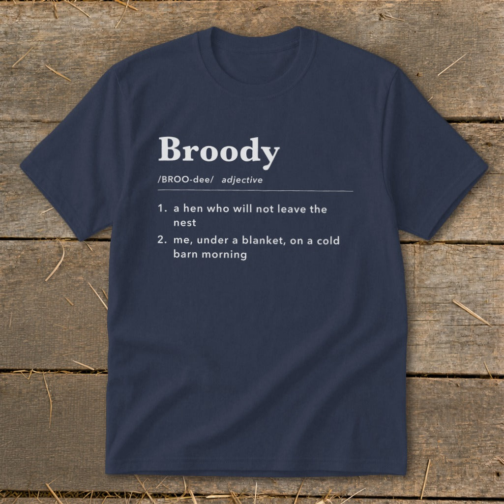 Navy t-shirt with "Broody" definition about a hen or being under a blanket.