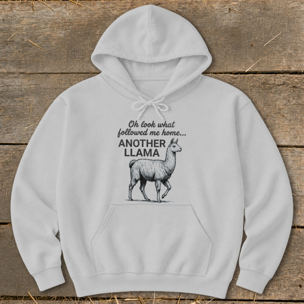 White hoodie with "Oh look what followed me home... ANOTHER LLAMA" text and llama graphic.