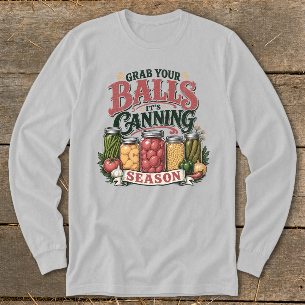 Graphic with jars of vegetables and text "Grab Your Balls It's Canning Season".