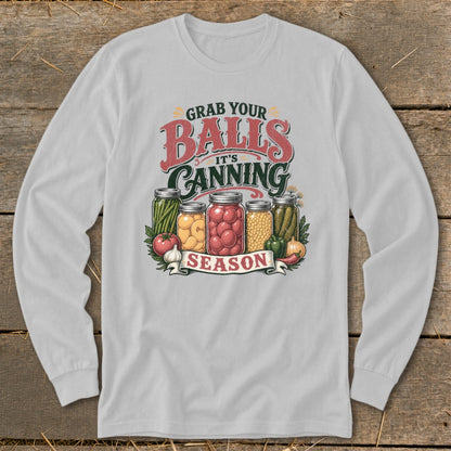 Graphic with jars of vegetables and text "Grab Your Balls It's Canning Season".