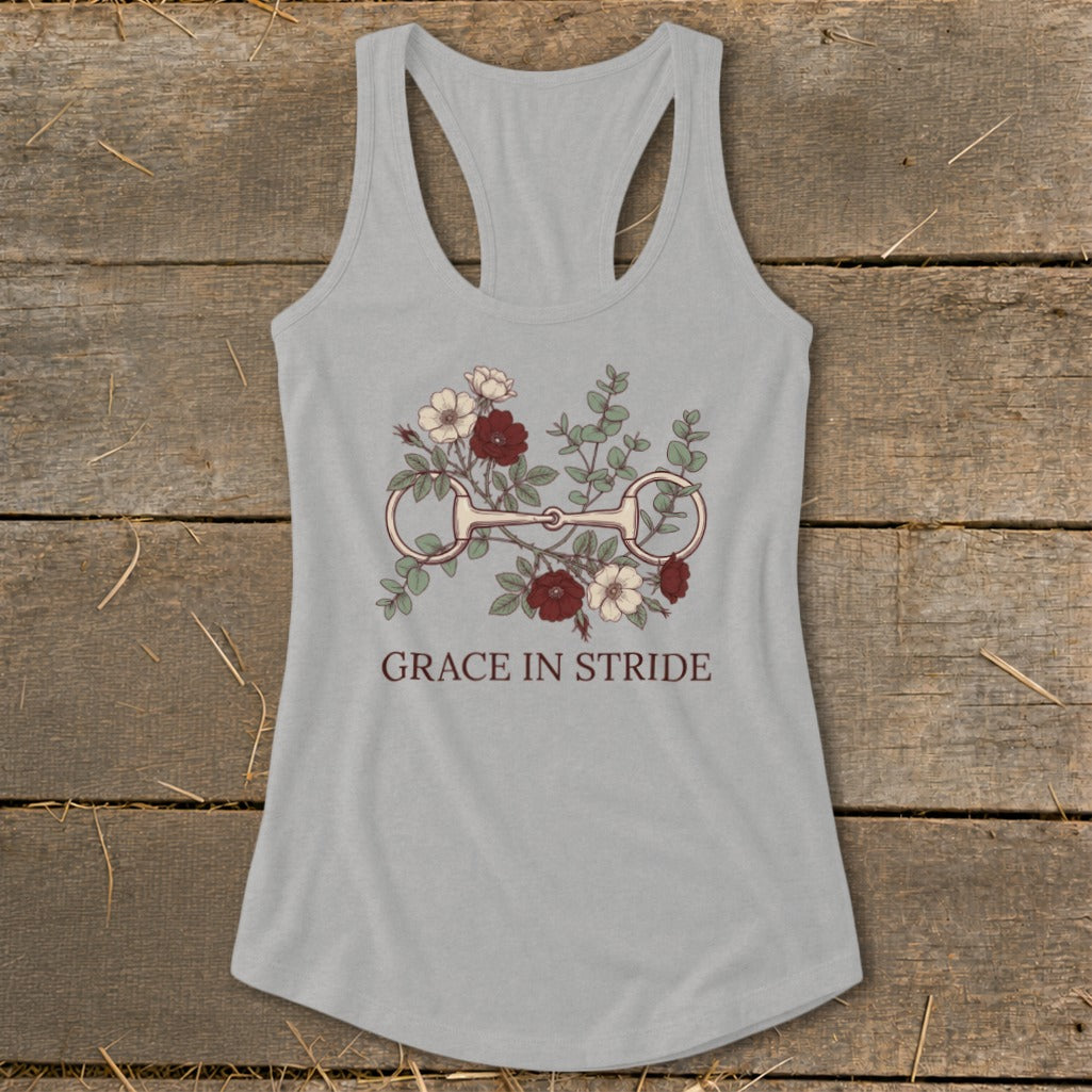 Gray tank top with floral equestrian bit graphic and "GRACE IN STRIDE" text.