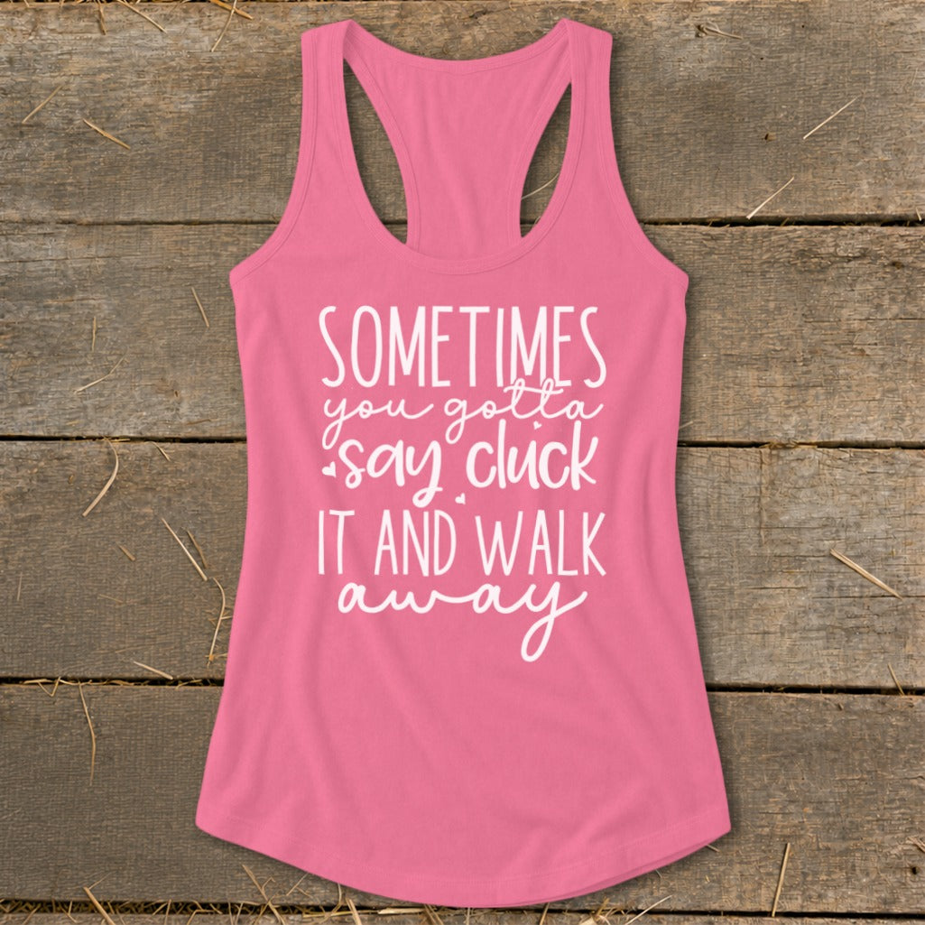 Pink racerback tank top with white text that reads "Sometimes you gotta say cluck it and walk away".