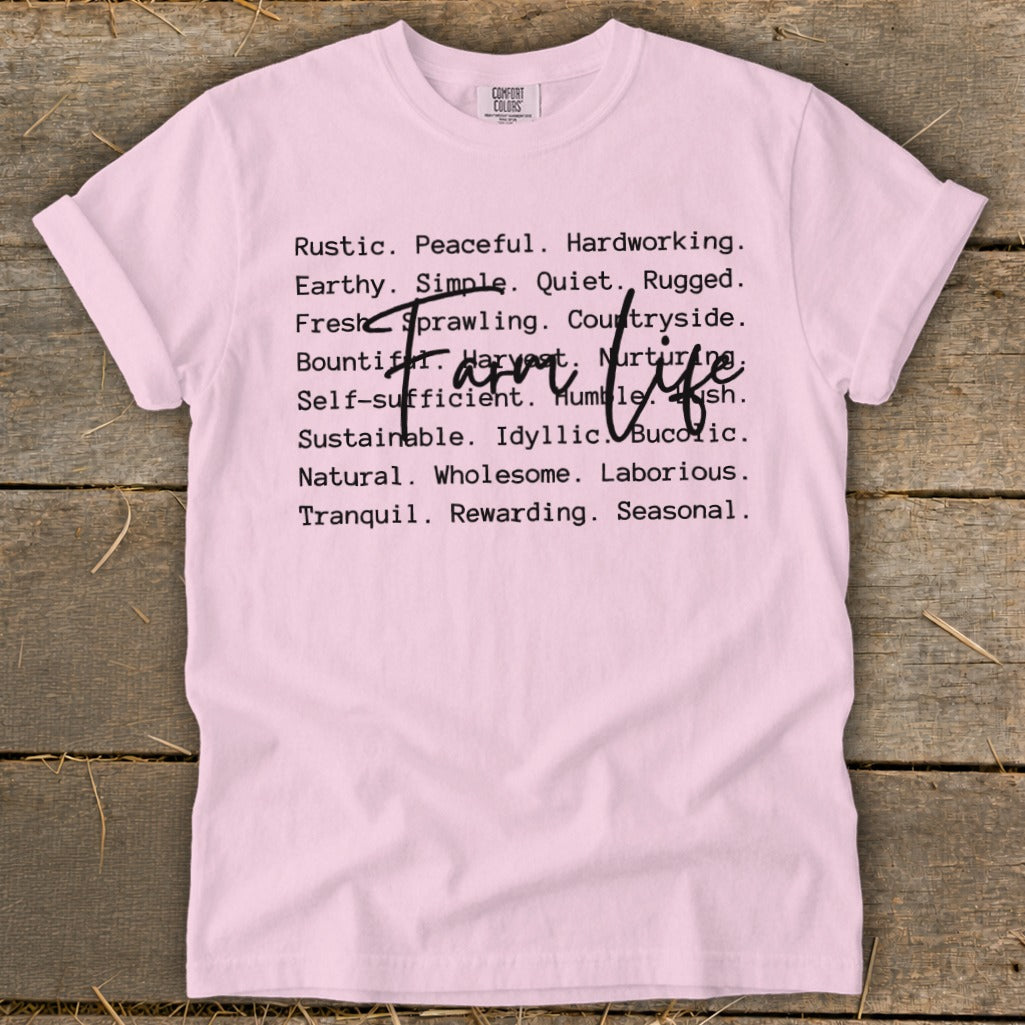 Pink t-shirt with "Farm Life" overlaying descriptive words.