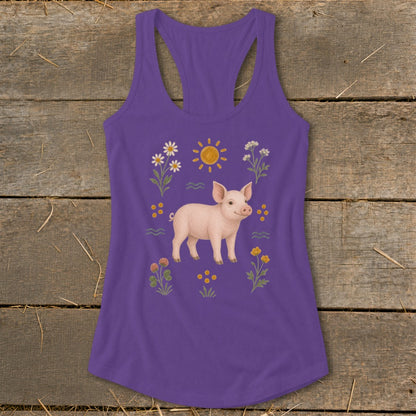 Purple tank top with a graphic of a pig surrounded by flowers and a sun.
