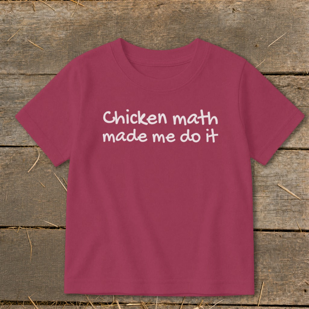 Toddler t-shirt with "Chicken math made me do it" white text.
