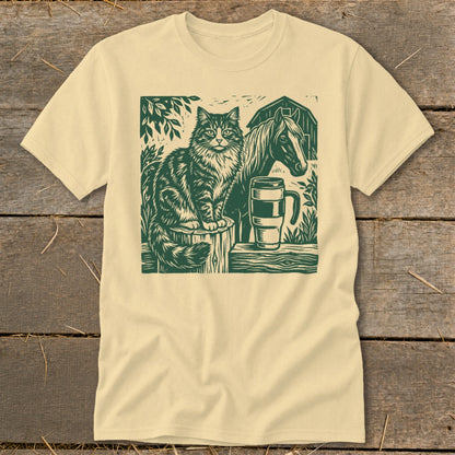 Cat sitting on a post with horse and mug next to a barn.